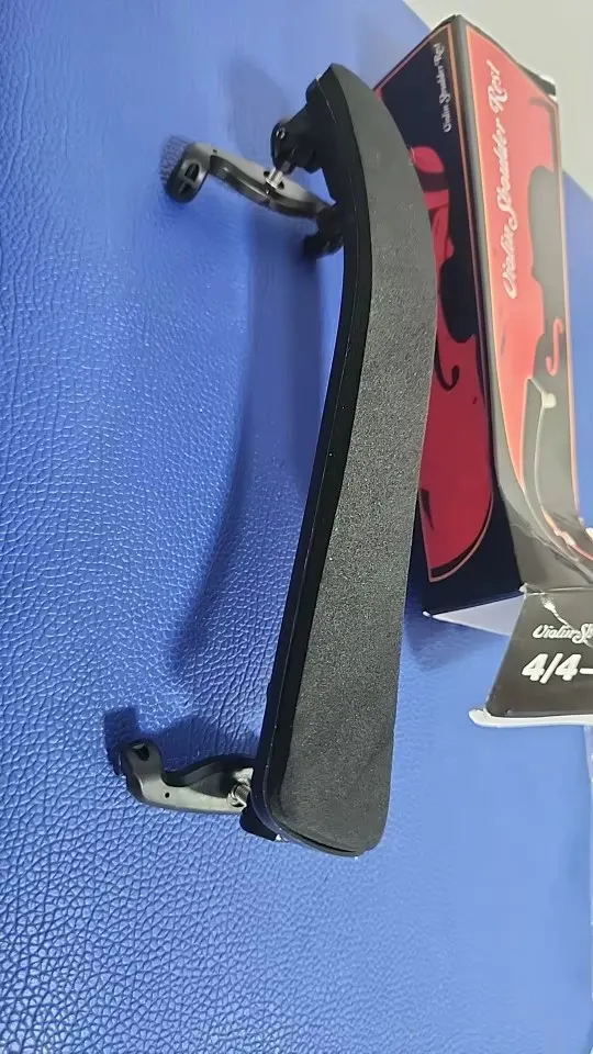 Black foam-cushioned shoulder rest beside its printed box labelled 4/4-3/4, photographed by Daniel K., a verified buyer